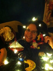 Iris helps decorate the tree