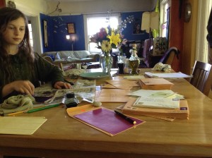 Phase two of thank you cards completed- Martin is adding his hand carved oak leaf stamp to each envelope.
