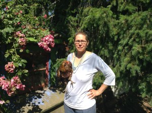 Mrs. Penny Feather the one eyed chicken is happy to oblige me by acting as accessory .