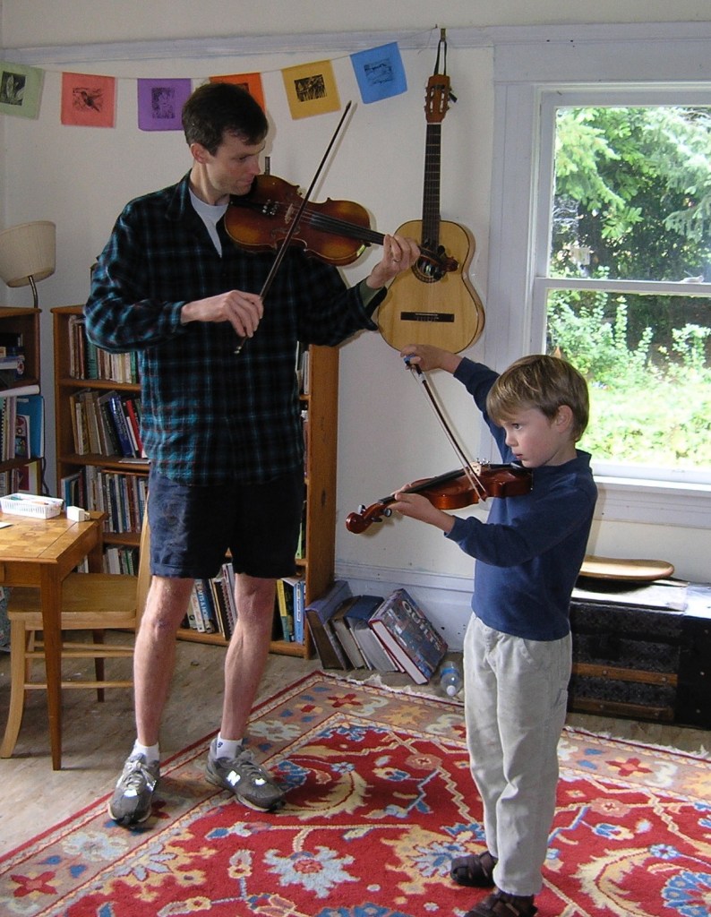 A moment in the brief but beautiful stage of Sam taking fiddle lessons.